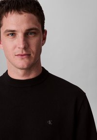 Calvin Klein Jeans RELAXED - Jersey de punto - black