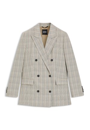 Dwurzędowa marynarka w jasnobeżowym kolorze z wzorem w kratę. Posiada szpiczaste klapy, dwie przednie kieszenie oraz czarne guziki. Krój dopasowany.