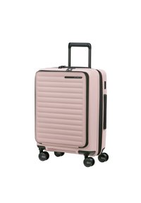Hard-shell suitcase in light pink, featuring ribbed texture, black accents, retractable handle, and four wheels for mobility.