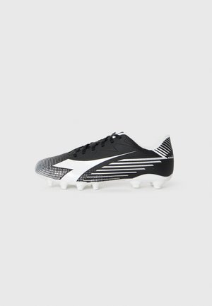 Black and white soccer cleat with a textured upper, featuring a mesh pattern, sharp white accents, and six white studs on the sole.