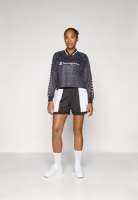 Champion SPORT HERITAGE LONG SLEEVES V NECK - Hosszú ujjú felső - black