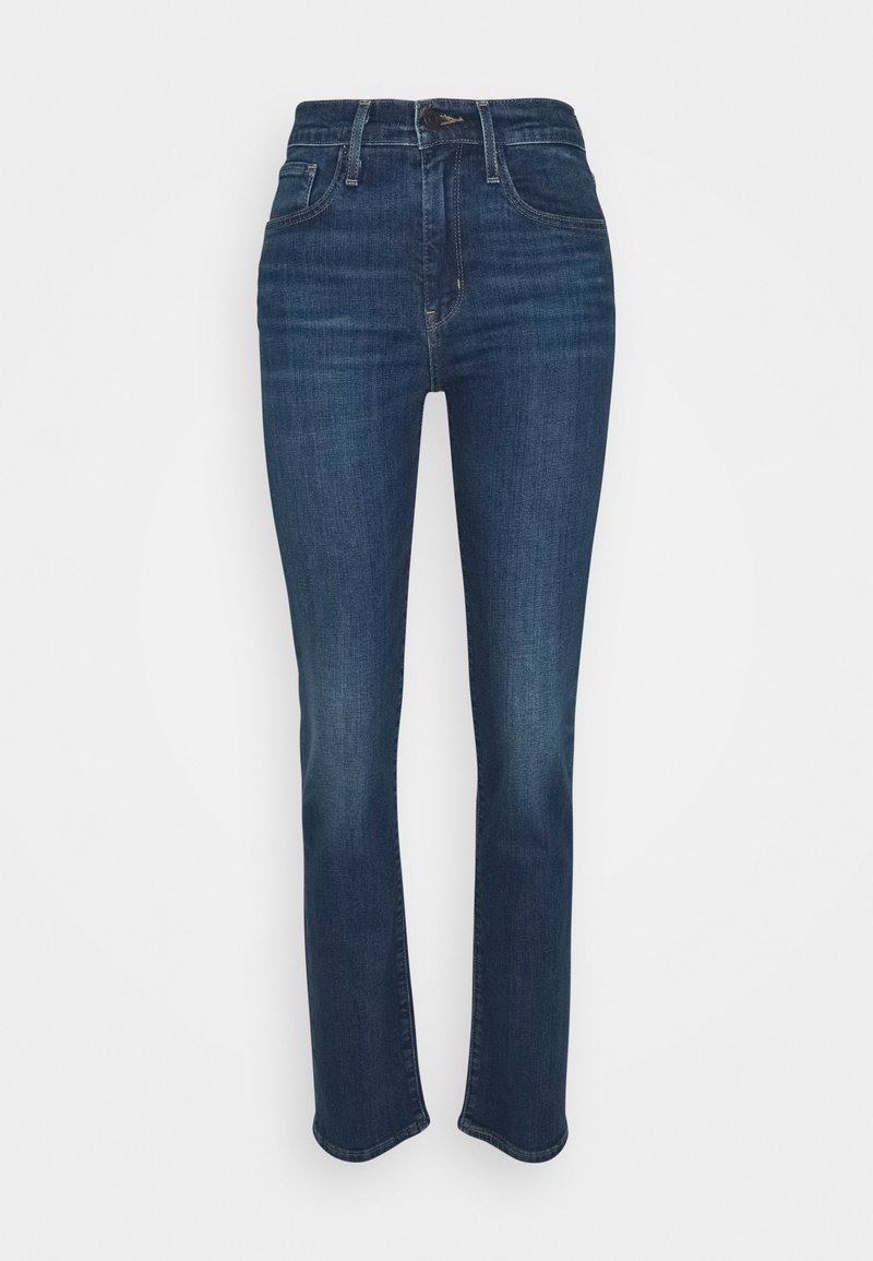 Jeans azul oscuro de cintura alta, diseño de pierna recta, cinco bolsillos y costuras sutiles a lo largo de las costuras. Tejido de mezclilla texturizada.
