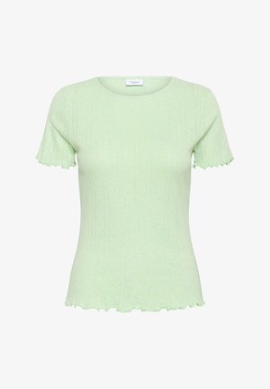 Haut en tricot côtelé vert clair avec des manches courtes ondulées et un ourlet festonné. Présente des détails de motif vertical sur l'ensemble.