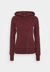 Burgunderfarvet zip-up hoodie lavet af blødt stof, med hætte, asymmetrisk frontlynlås og ribkanter ved ærmerne og kanten for komfort.