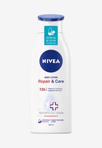 Buy Nivea Body Lotion Repair & Care For Extra Dry Skin 400 ml Online in UAE Trad
