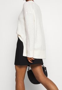 Modström Minifalda - black