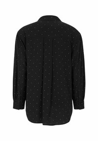Schwarzes Langarmhemd mit weißem Punktmuster, weicher Stoff, klassischer Kragen, Knopfmanschetten und eine Falte hinten für zusätzlichen Detail.
