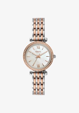 Fossil armbåndsur med rosaguldfarvet og sølvfarvet ledet lænke, hvid urskive med romerske tal i rosaguldfarve og krystaller på ringen, viser 10:10:36.