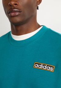 adidas Originals ADIBREAK CREW - Sweatshirt - legacy teal