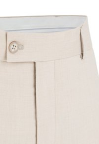Beżowe spodni z dopasowanym krojem, wykonane z teksturowanej tkaniny, z prostym krojem, z zapięciem na guzik z przodu i gładką podszewką.