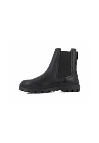Botas Chelsea negras de cuero con paneles laterales elásticos, punta redonda, suela resistente y una lengüeta en la parte trasera para ponérselas fácilmente.
