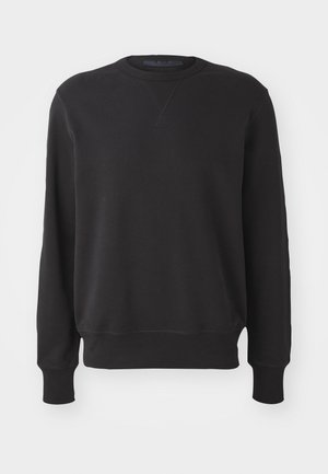 Black crewneck sweatshirt made of soft fabric; features long sleeves, ribbed cuffs and hem, with a relaxed fit and minimal design.