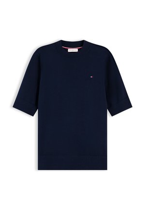 Tumesinine lühikeste varrukatega kudumpluus ümmarguse kaelusega ja väikese Tommy Hilfigeri logoga rinnal.