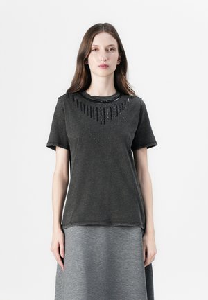 Black short-sleeve t-shirt made of cotton with a textured pattern of beads along the neckline, featuring a relaxed fit and rounded hem.