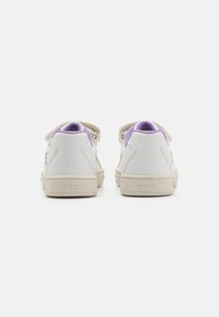 White leather sneakers with purple and grey accents, featuring a textured suede heel tab and a beige rubber sole. Geox branding visible.