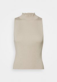 Beige ribbattu pääntönä ja röyhelöreunuksena varustettu ilman hihoja oleva toppi, valkoista taustaa vasten.