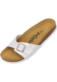 Vit slidesandal med en bred rem och en silverfärgad spänne. Korkinlägg och strukturerad brun sula. Gummiyttersula som ger bra grepp och komfort.
