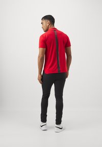 Björn Borg TRAINING PANTS - Pantalones deportivos - black beauty