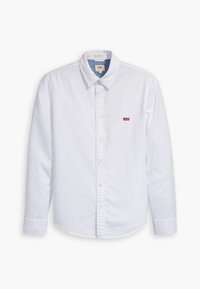 Biała bawełniana koszula na guziki z ostro zakończonym kołnierzykiem i długimi rękawami, z małym czerwonym logo Levi's na lewej piersi.