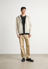 BOSS SAGGY - Majica s kapuljačom i patentnim zatvaračem - light beige