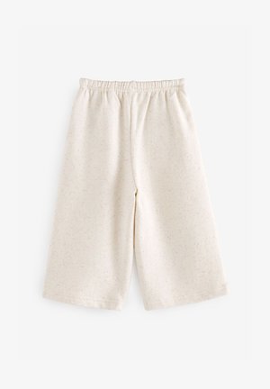 Gaiši bēša krāsas šorti no mīksta auduma ar pasteļtoņu raibu rakstu. Aprīkoti ar elastīgu jostasvietu un taisnas griezuma kājām.