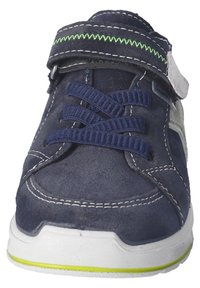 Navy suede sneaker with white stitching, elastic laces, and a strap. Features a gray accent and a green zigzag pattern on the strap. White sole.