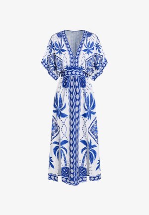 Blauw-witte maxi-jurk met een V-hals, korte kimono mouwen en een elastische taille. Voorzien van bloemmotieven en geometrische patronen. Lichtgewicht stof.