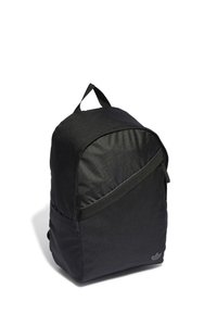 Black backpack with a smooth texture, curved shape, and angled front pocket. Features a top handle and a subtle logo on the side.
