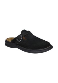Scarpa slip-on in suede nero con punta rotonda, dotata di un dettaglio con fibbia laterale e suola in gomma nera texture. All'interno presenta una soletta marrone.