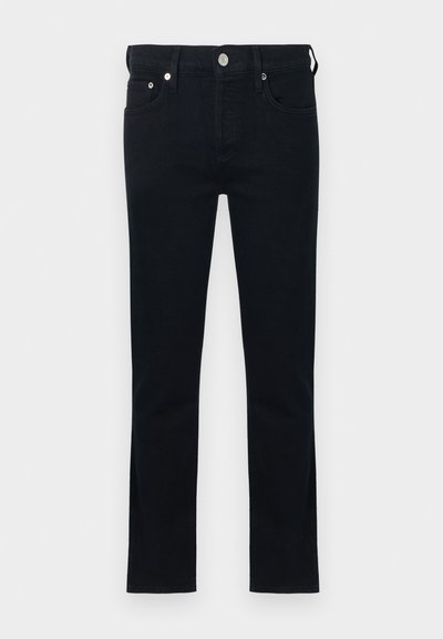 Black denim jeans with a fitted design, featuring a standard waistband, zip fly, and five-pocket styling. Smooth texture, straight legs.