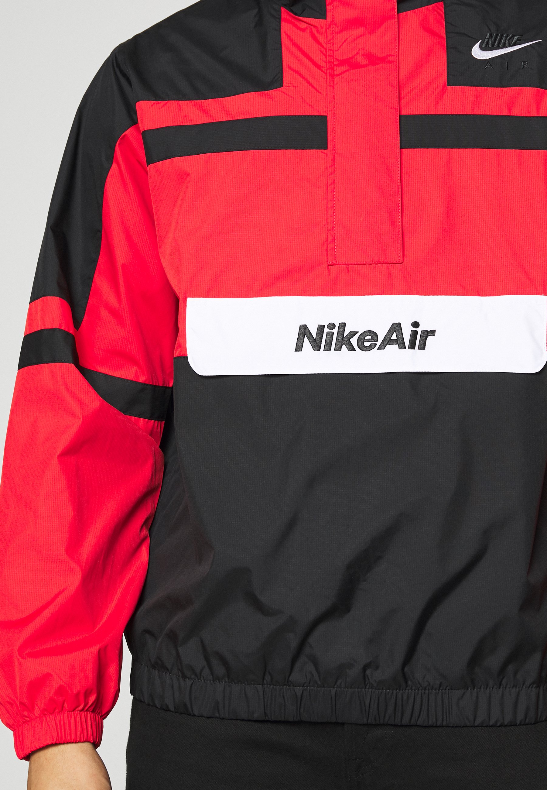 red black and white nike windbreaker