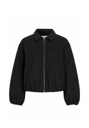 Veste noire à fermeture éclair avec col, poignets et ourlet élastiques, et poches latérales, présentée sur un fond blanc.