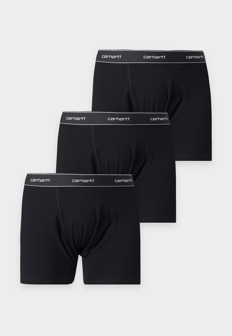 Drei schwarze Carhartt Boxershorts mit gebrandetem elastischem Bund auf weißem Hintergrund gestapelt.
