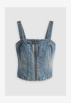 Τζιν cropped top με πλατιές τιράντες, διαθέτει μπροστινό φερμουάρ. Απαλή μπλε απόχρωση με κάθετες ραφές και εφαρμοστή σχεδίαση.