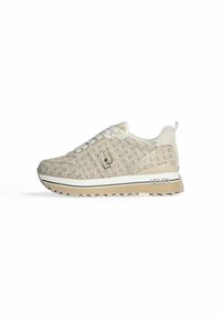 Sneaker beige con tomaia a fantasia e logo bianco. Presenta una suola ammortizzata con grip testurizzato e strisce laterali a contrasto.