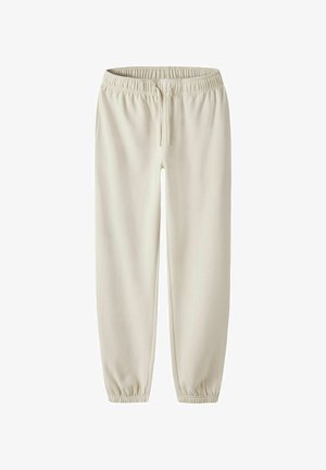 Lichtbeige sweatpants met een elastische tailleband met trekkoord, taps toelopende pijpen met elastische boorden en een gladde, zachte textuur.
