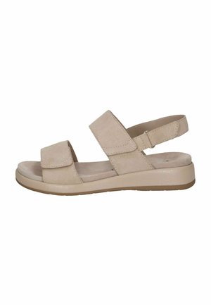 Sandales beige clair avec deux brides en Velcro réglables et une semelle intérieure rembourrée. La semelle est de couleur claire, texturée et légèrement surélevée.