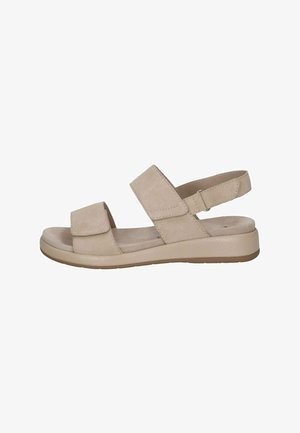 Sandales beige clair avec deux brides en Velcro réglables et une semelle intérieure rembourrée. La semelle est de couleur claire, texturée et légèrement surélevée.