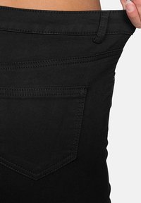 Elara STRETCH - Vaqueros pitillo - schwarz