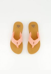 Pink flip-flops with textured fabric straps featuring a geometric pattern, and a smooth tan rubber sole, displaying a logo on the footbed.