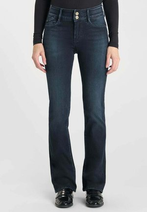 Jean flare bleu foncé avec une taille haute, comportant deux boutons dorés et des poches avant. Le tissu a une texture en denim lisse.