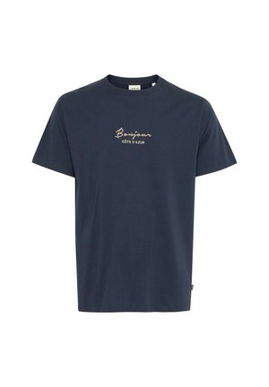 Tumesinine puuvillane T-särk lühikeste varrukatega, mille esiküljel on beezis kiri "Bonjour Côte d'Azur" kursiivis. Klassikaline ümar kaelus.