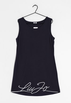 Navy sininen hihaton paita, joka on valmistettu pehmeästä kankaasta ja jossa on pyöreä pääntie sekä valkoinen kirjailtu logo helman kohdalla.