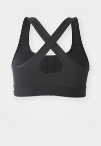 Black sports bra made from stretchy material. Features a crisscross back design and wide straps for support. Smooth texture, no patterns.