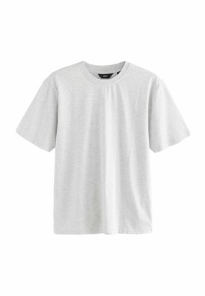 T-shirt in cotone grigio chiaro con colletto tondo classico, maniche corte e vestibilità rilassata con una texture liscia. Senza motivi né accenti.