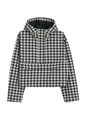 Chaqueta con capucha de patrón de espiga en blanco y negro, con mangas largas y un bolsillo frontal.