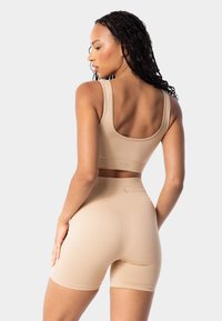Carpatree SIMPLY SEAMLESS  - Sujetadores deportivos con sujeción media - beige