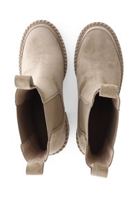 Beige suede ankle boots with elastic side panels, textured rubber soles, and pull tabs at the heel. Features a rounded toe and durable construction.
