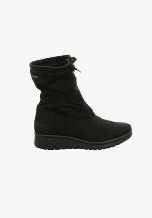 Schwarze Wildleder-Ankle Boots mit einem lockeren Design, ausgestattet mit einem seitlichen Reißverschluss und einer Gummisohle für besseren Halt. Verstellbare Schnürung am oberen Rand.