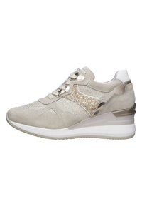 Beige sneaker with suede and glitter accents, featuring a padded collar, laces, and a wedge heel. Textured upper with white sole.